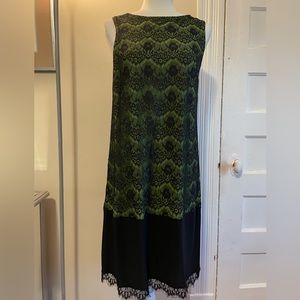 Isaac Mizrahi black sleeveless lace dress with green underlay. Woman’s size 12.